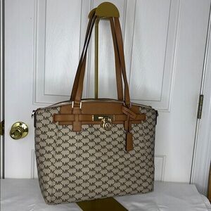 Michael Kors Hamilton Traveler Large Zip Satchel signature logo-print design.